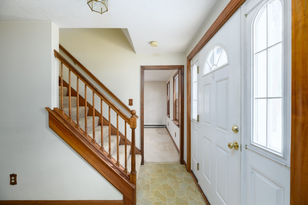 224 Podunk Road Sturbridge, MA 01566 - Photo 21 of 26 a view of an entryway with staircase