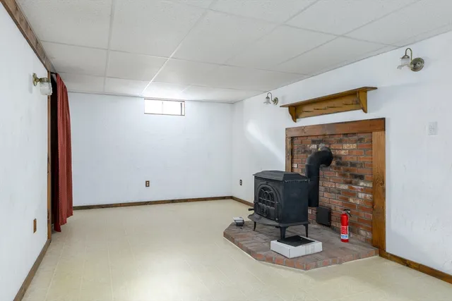 a room with furniture and white walls