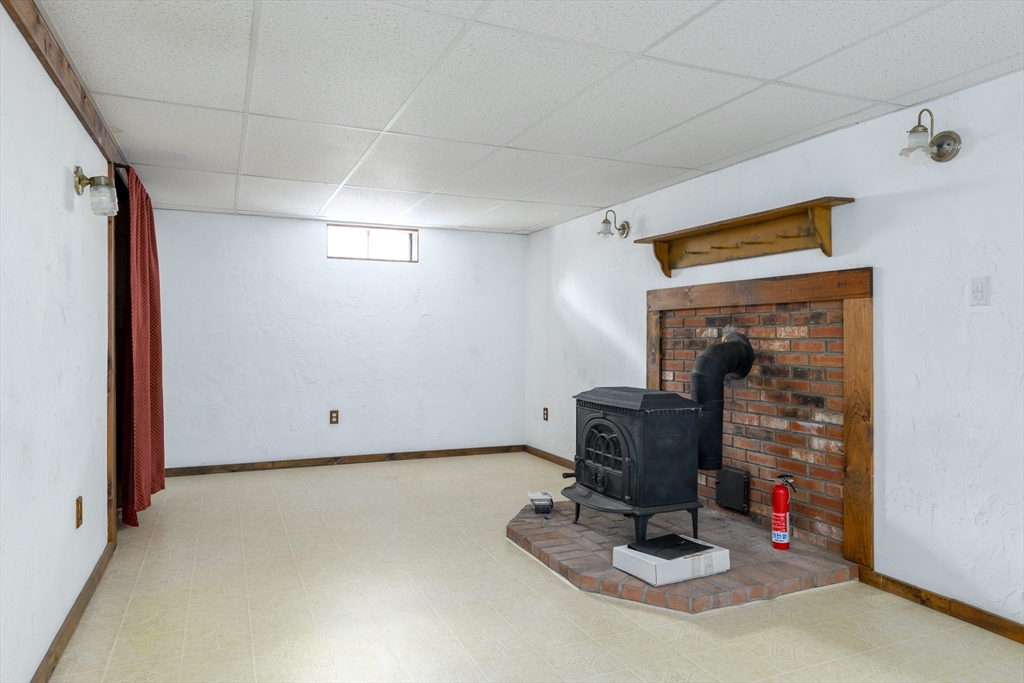 224 Podunk Road Sturbridge, MA 01566 - Photo 22 of 26 a room with furniture and white walls