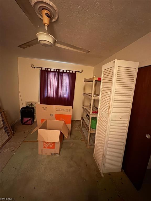 18 Alabama Road North Lehigh Acres, FL 33936 - Photo 13 of 18 a view of a livingroom with furniture and staircase