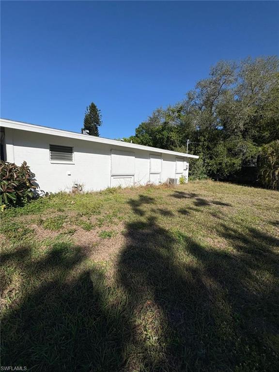 18 Alabama Road North Lehigh Acres, FL 33936 - Photo 4 of 18 a view of an outdoor space and a yard