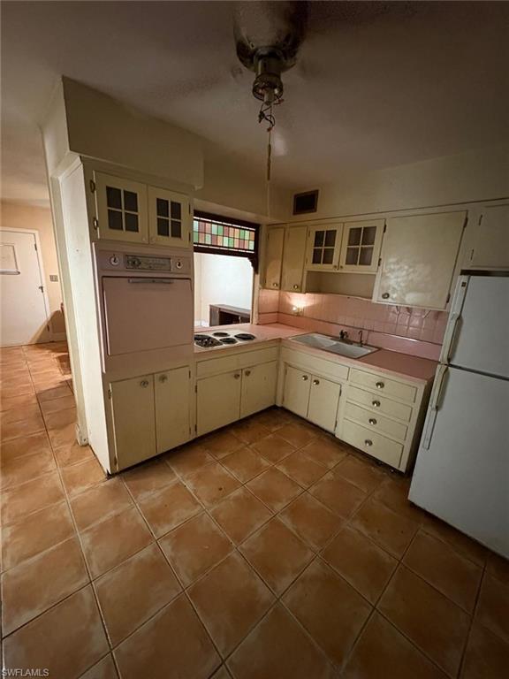 18 Alabama Road North Lehigh Acres, FL 33936 - Photo 5 of 18 a kitchen with a sink appliances and cabinets