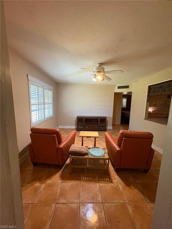 18 Alabama Road North Lehigh Acres, FL 33936 - Photo 6 of 18 a room with furniture and window