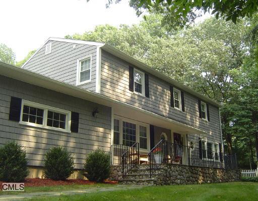 275 Russet Road Stamford, CT 06903 - Photo 1 of 1 a front view of a house with garden