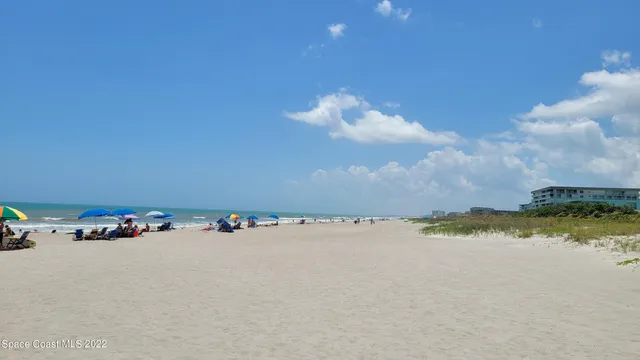 a kitchen with granite countertop a stove oven and sink
