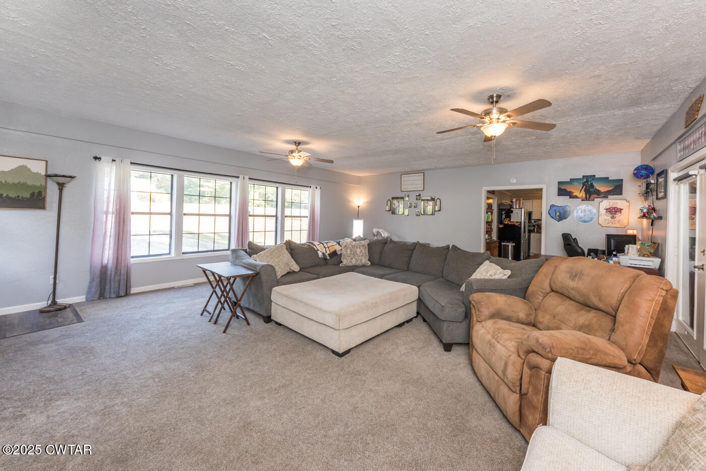 1840 Blue Goose Road Huron, TN 38345 - Photo 13 of 35 a living room with furniture and a large window