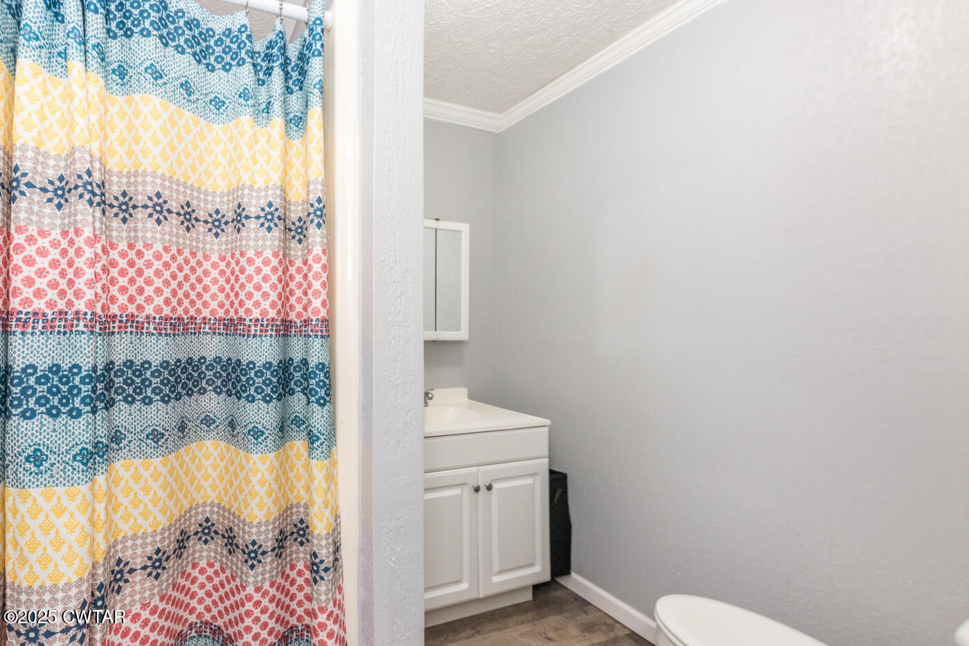 1840 Blue Goose Road Huron, TN 38345 - Photo 20 of 35 a bathroom with a sink toilet and window