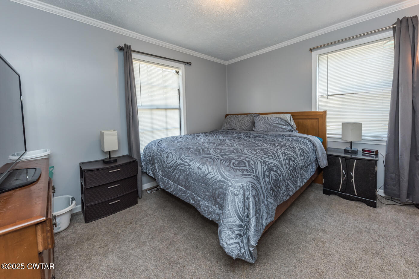 1840 Blue Goose Road Huron, TN 38345 - Photo 21 of 35 a bedroom with a bed and a window