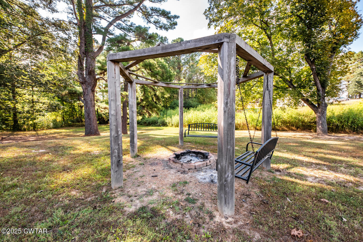 1840 Blue Goose Road Huron, TN 38345 - Photo 25 of 35 a view of a house with backyard and sitting area