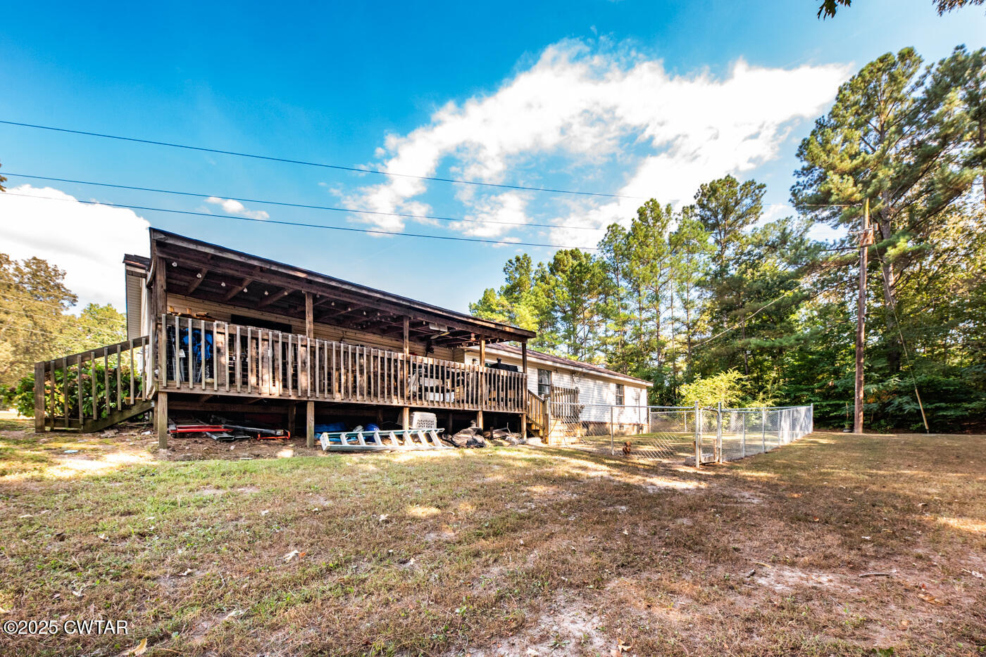 1840 Blue Goose Road Huron, TN 38345 - Photo 27 of 35 a large house with a large tree in front of it