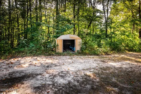 a view of an outdoor space and a yard
