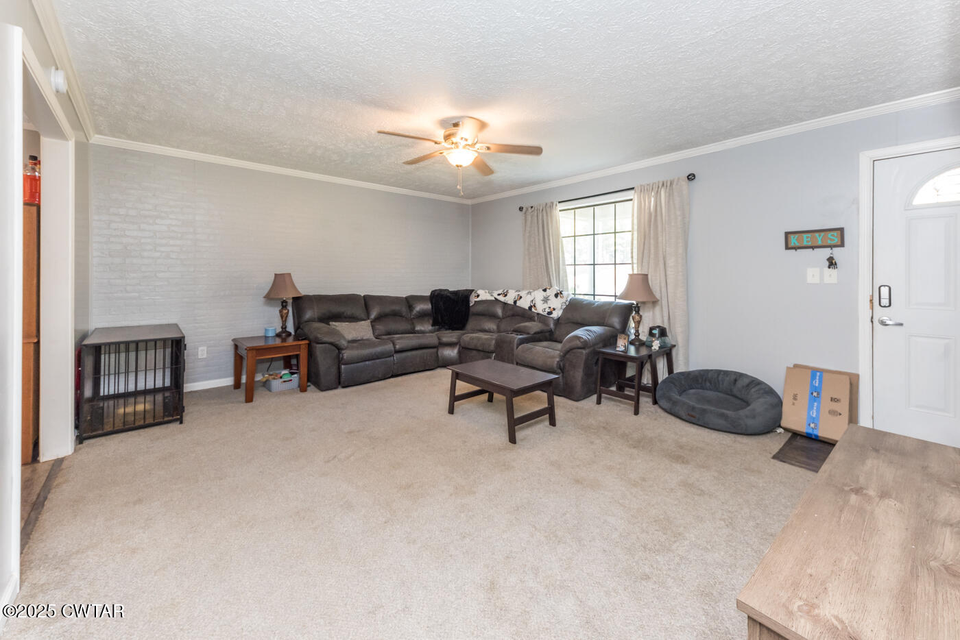 1840 Blue Goose Road Huron, TN 38345 - Photo 7 of 35 a living room with furniture and a window