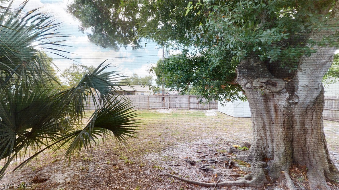 19154 Birch Road Fort Myers, FL 33967 - Photo 11 of 24 a view of outdoor space with trees