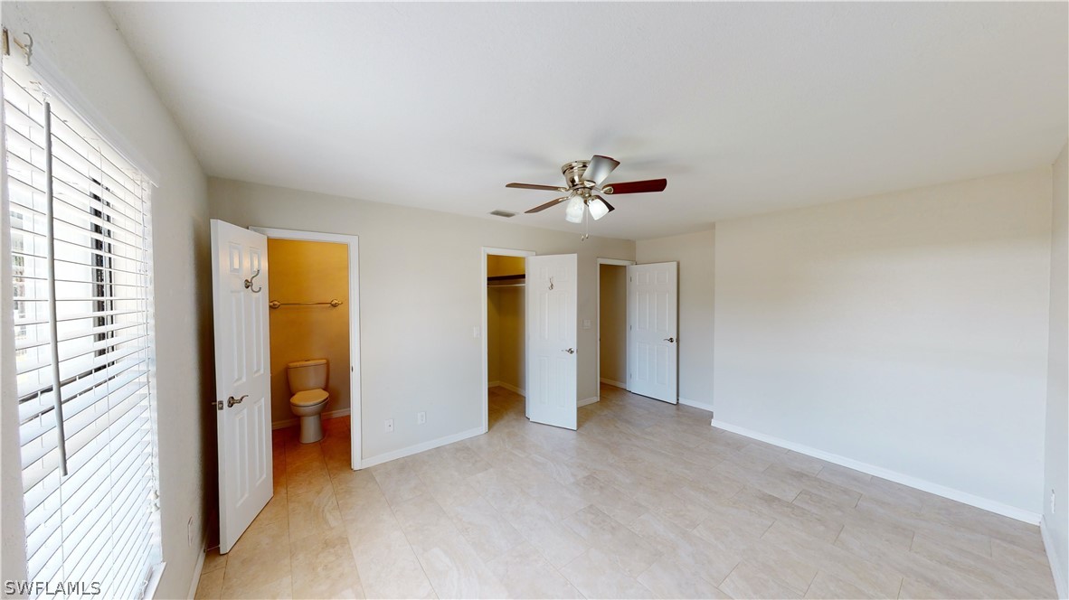 19154 Birch Road Fort Myers, FL 33967 - Photo 13 of 24 a view of an empty room with a window