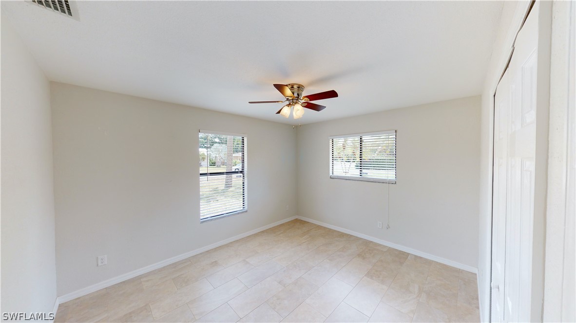 19154 Birch Road Fort Myers, FL 33967 - Photo 15 of 24 a view of an empty room with a window