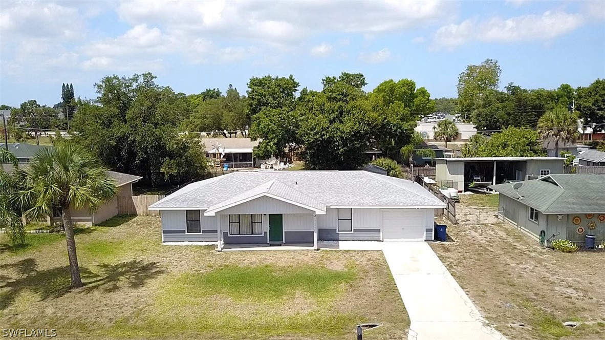 19154 Birch Road Fort Myers, FL 33967 - Photo 20 of 24 an aerial view of a house with swimming pool and big yard