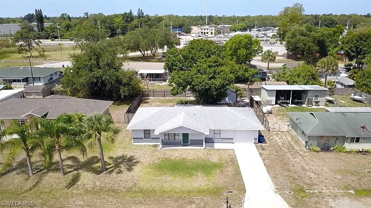19154 Birch Road Fort Myers, FL 33967 - Photo 22 of 24 an aerial view of a house with a big yard