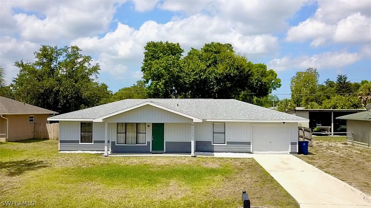 19154 Birch Road Fort Myers, FL 33967 - Photo 23 of 24 a aerial view of a house with swimming pool and deck