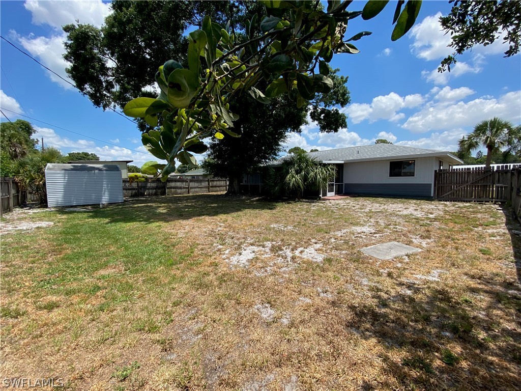 19154 Birch Road Fort Myers, FL 33967 - Photo 3 of 24 a view of a house with a yard