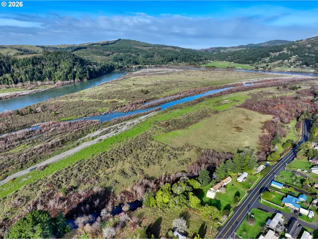a view of a yard with an outdoor seating