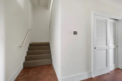 a view of entryway with stairs