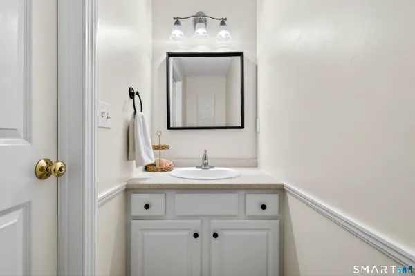 a kitchen with stainless steel appliances granite countertop a sink a cabinets and window