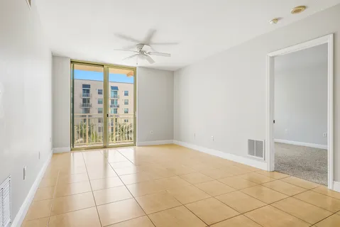 a view of an empty room with a window