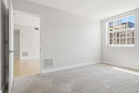 an empty room with windows
