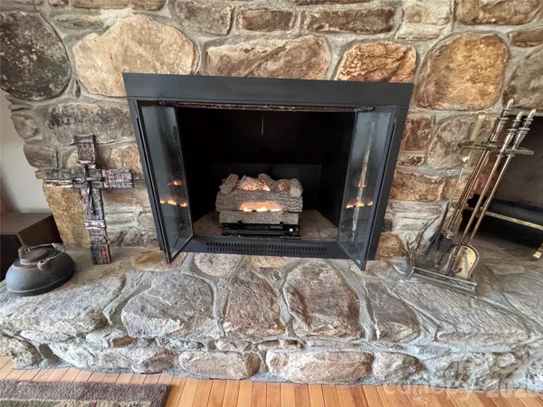 a bed with a fireplace