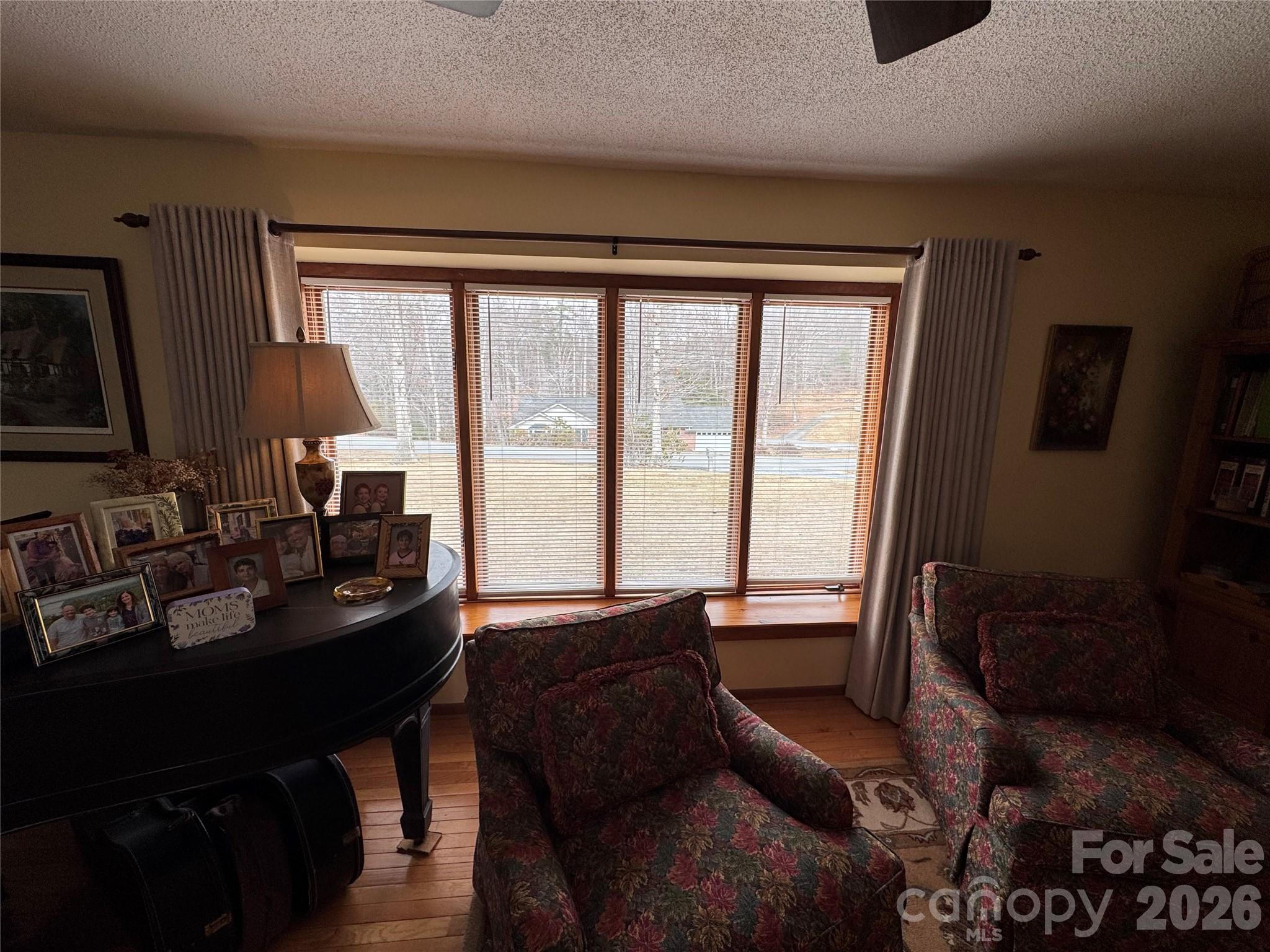 35 Azalea Drive Spruce Pine, NC 28777 - Photo 7 of 35 a living room with furniture and a window