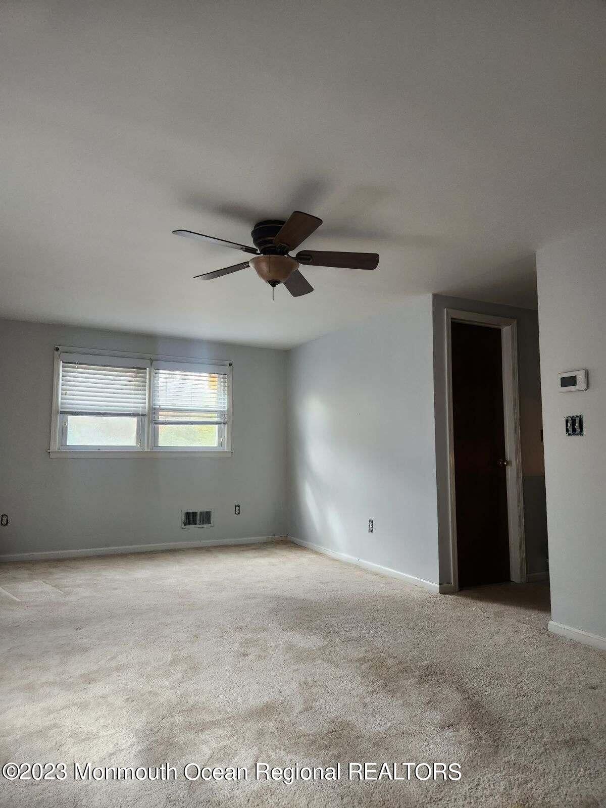 42 Epping Drive Kenilworth, NJ 07033 - Photo 14 of 22 a view of empty room with window