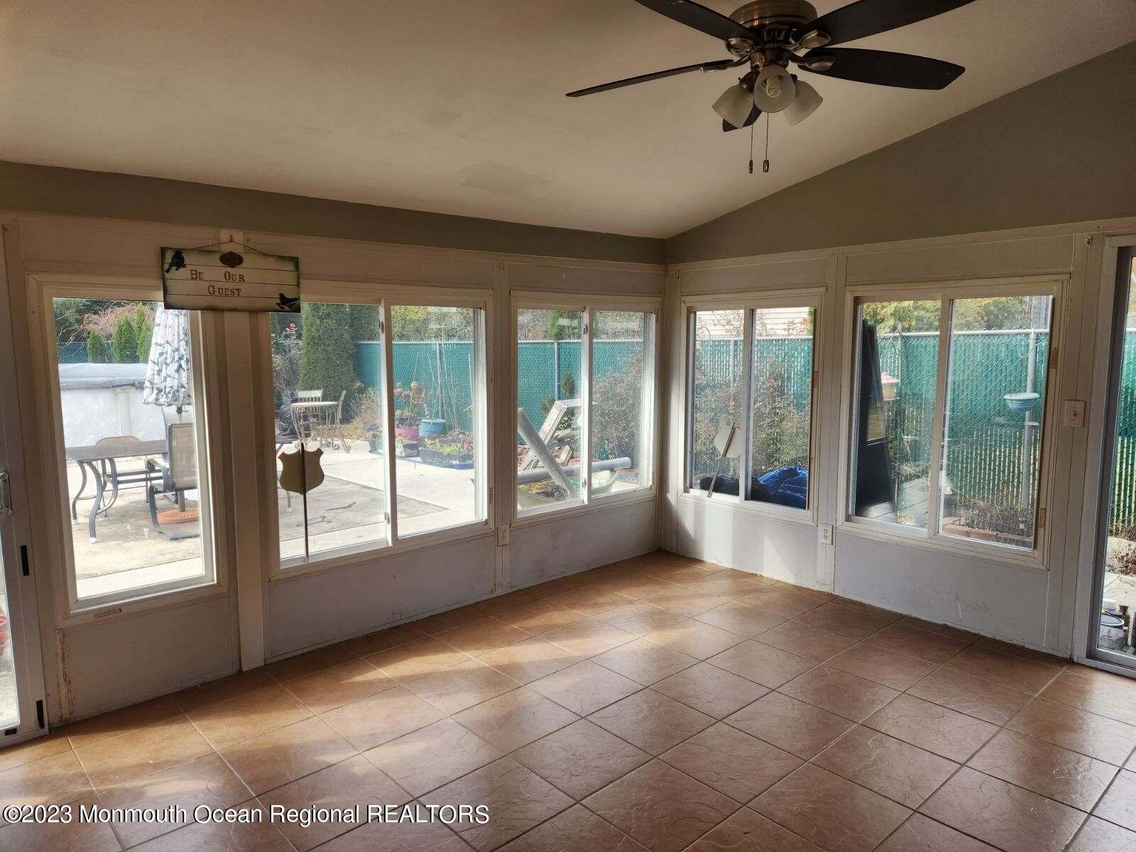 42 Epping Drive Kenilworth, NJ 07033 - Photo 17 of 22 a view of an empty room with a window