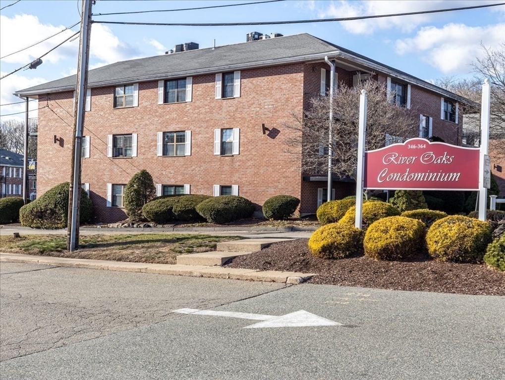 360 Neponset Street, Unit 702 Canton, MA 02021 - Photo 1 of 21 a sign that is on the side of a building