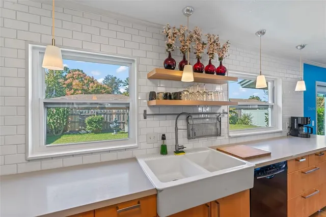 a room with microwave and window