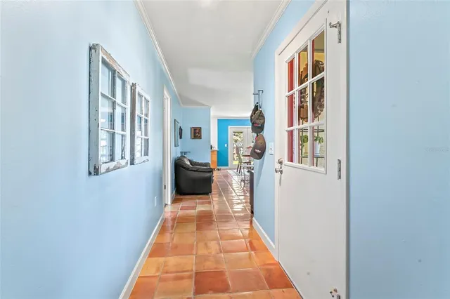 a view of a hallway with windows