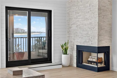 a living room with a fireplace