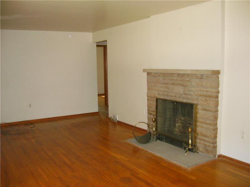 103 Ridgeside Road Pittsburgh, PA 15237 - Photo 2 of 17 Living Room. Livingroom With Log Burning Fireplace, Hardwood Floors