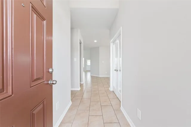 a view of a room with a hallway