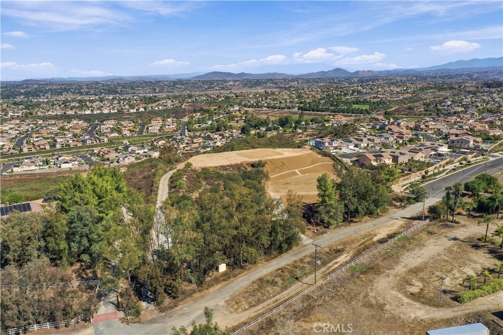 46161 Anza Road Temecula, CA 92592 - Photo 2 of 18 View form South West / showing concrete driveway and separate gate to View Pad
