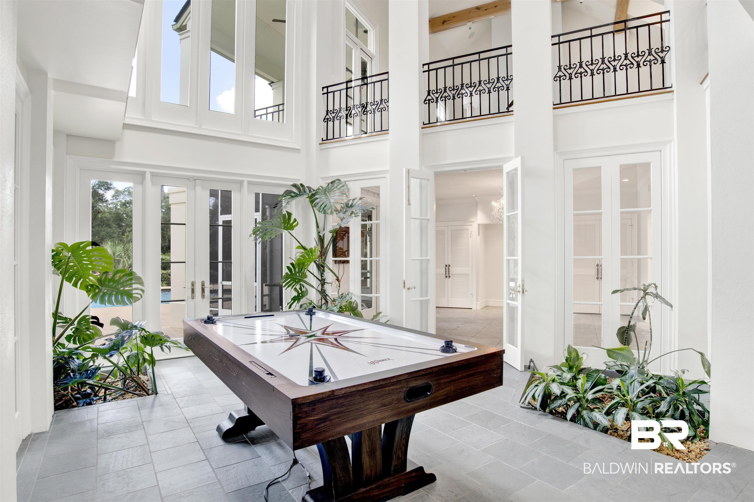 3816 Austill Lane Mobile, AL 36608 - Photo 43 of 80 Recreation room with french doors, a high ceiling, and tile patterned floors