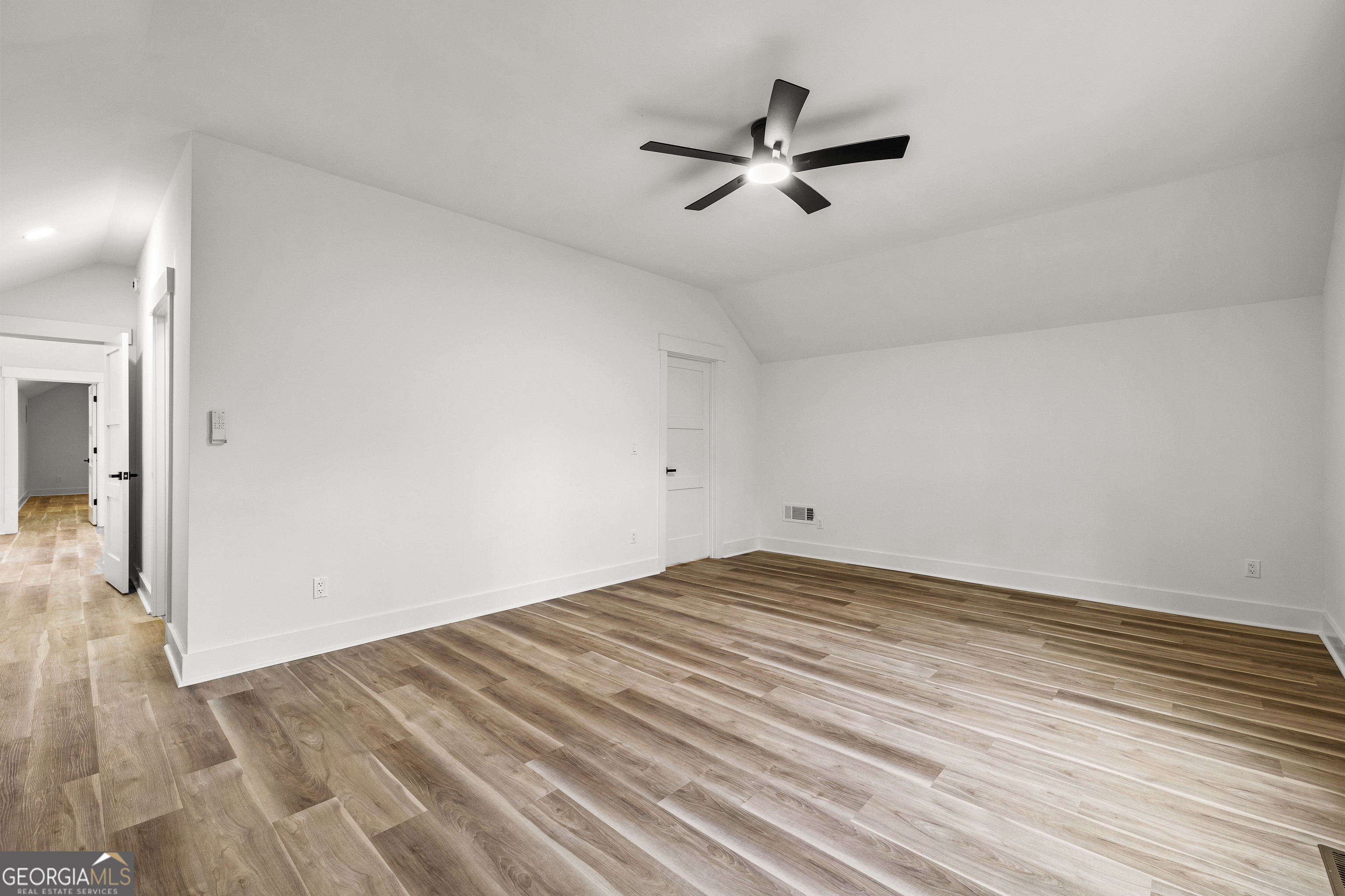 354 Turner Road Newnan, GA 30263 - Photo 52 of 79 a view of a room with wooden floor and white walls