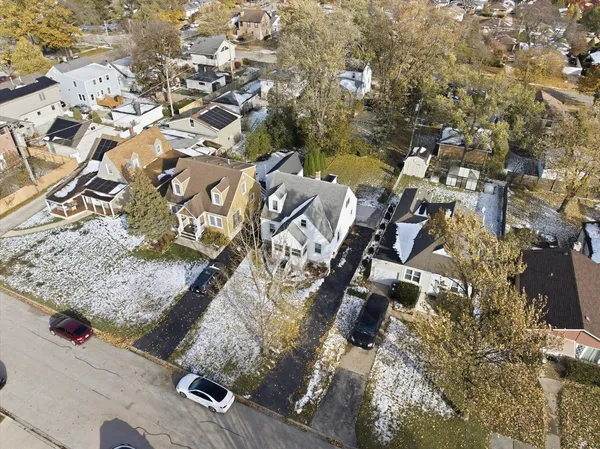 an aerial view of residential house with parking space