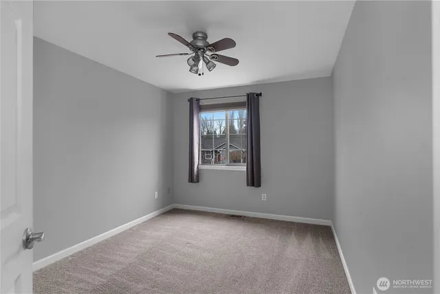 a view of a livingroom with a window
