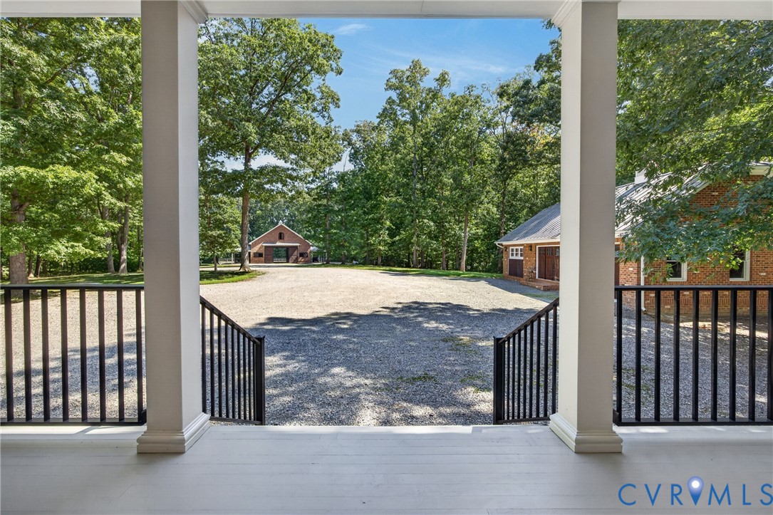 1108 Shallow Well Road Manakin-Sabot, VA 23103 - Photo 19 of 86 Expansive gravel driveway bordered by mature trees