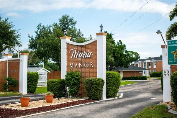 a sign on the side of a street