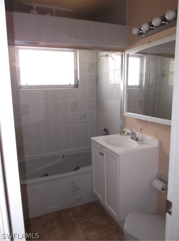 4 Homestead Road South Lehigh Acres, FL 33936 - Photo 6 of 8 a bathroom with a sink a toilet and shower