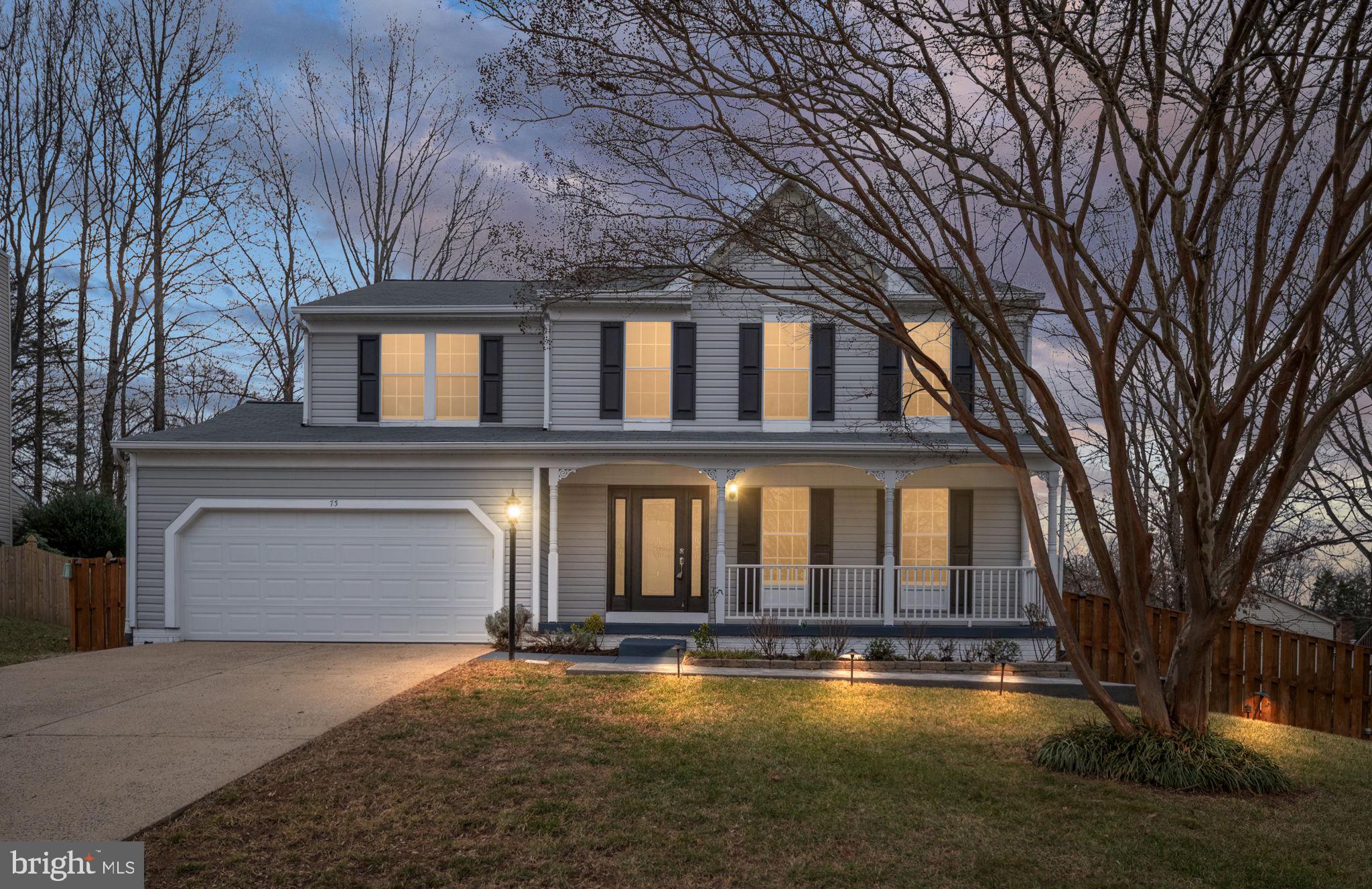 73 Spring Lake Drive Stafford, VA 22556 - Photo 1 of 71 a front view of a house with yard