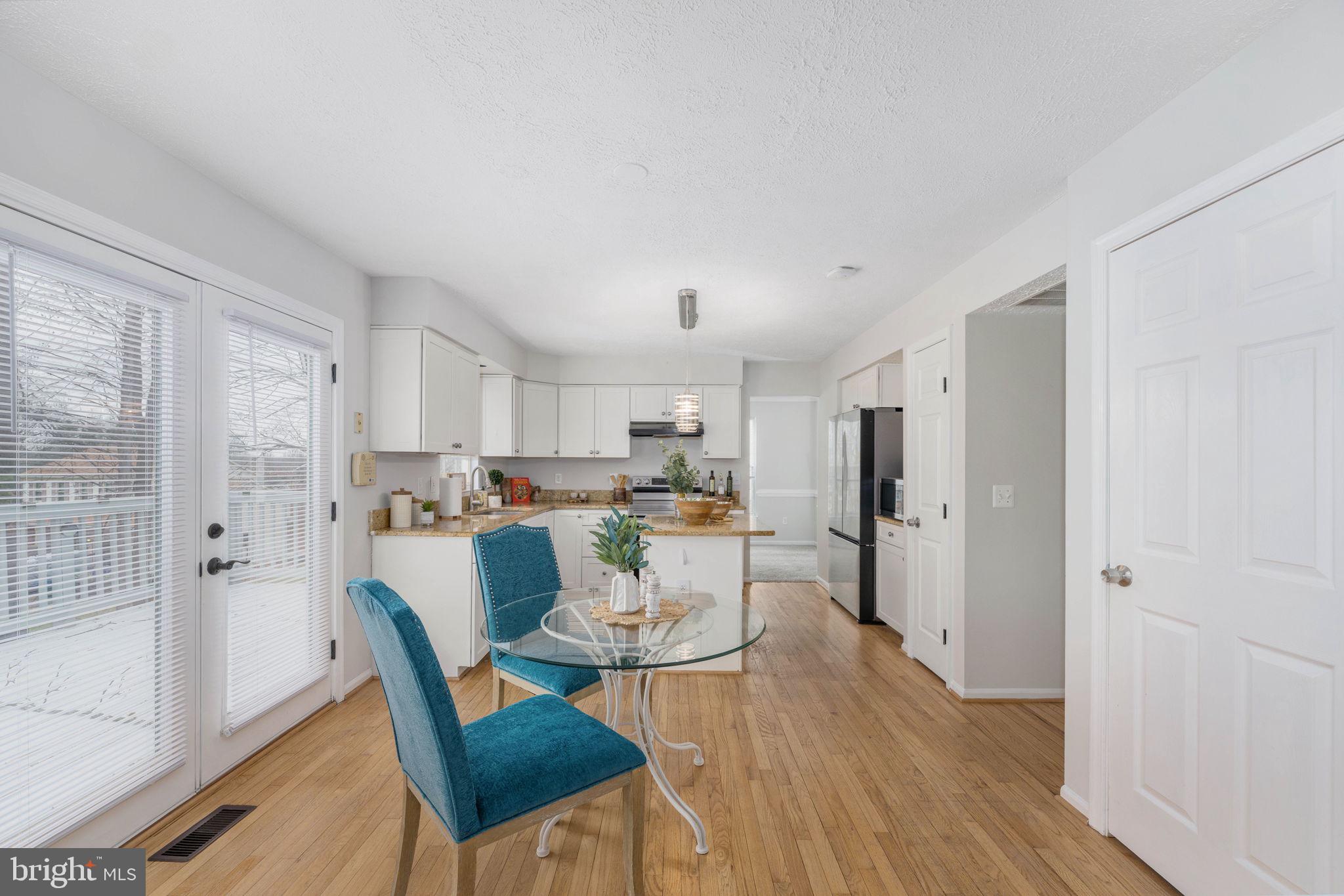 73 Spring Lake Drive Stafford, VA 22556 - Photo 17 of 71 a view of a dining room with furniture window and wooden floor