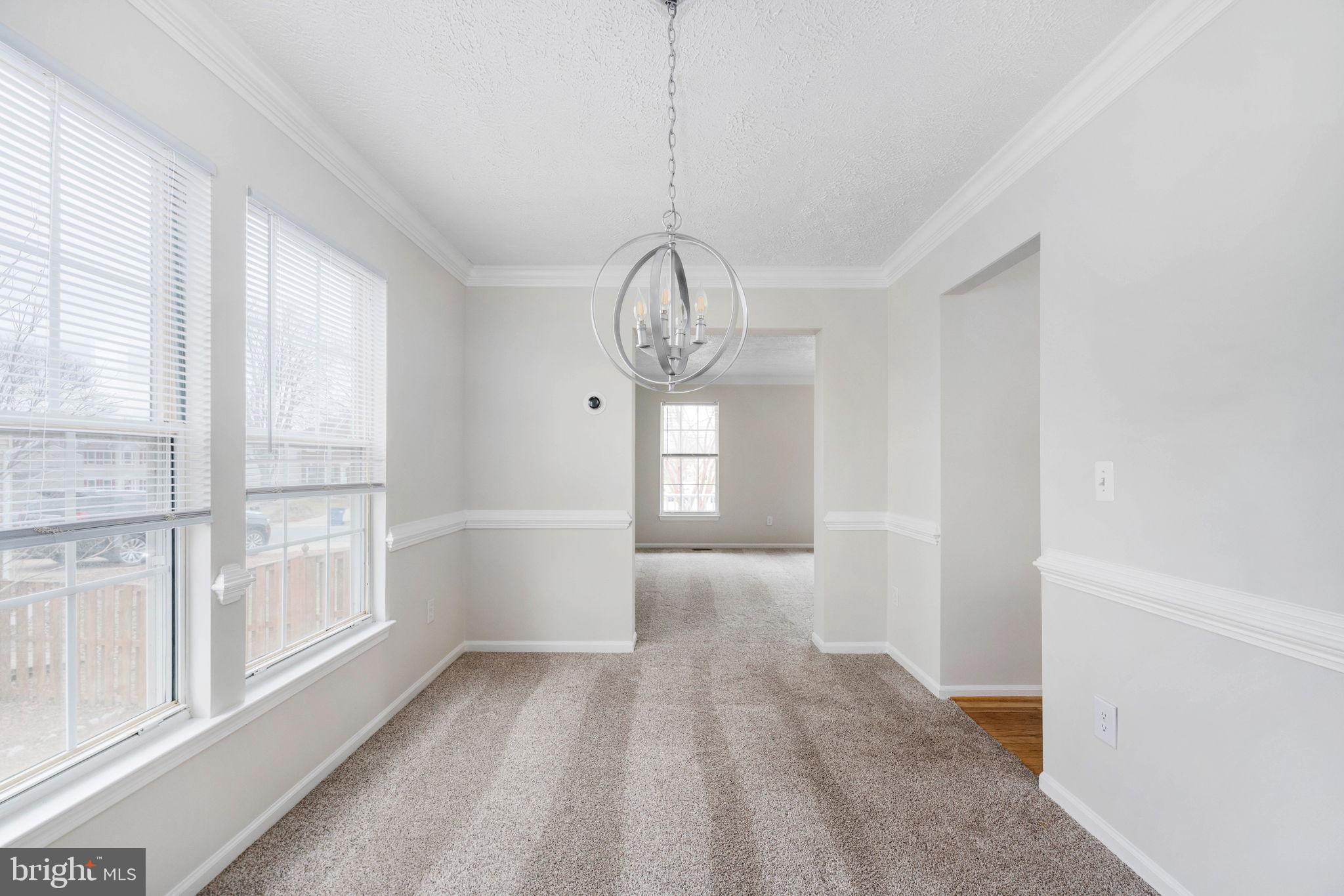 73 Spring Lake Drive Stafford, VA 22556 - Photo 31 of 71 a view of a room with wooden floor and windows