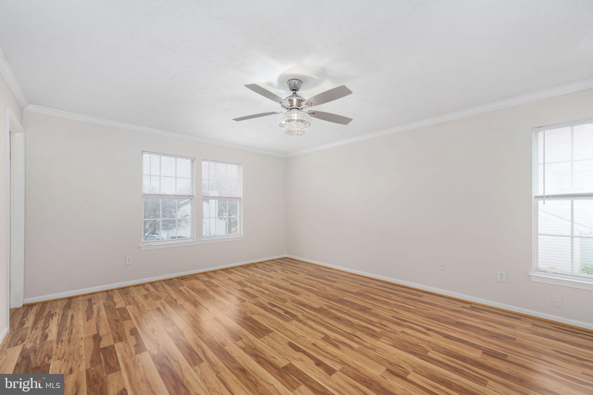 73 Spring Lake Drive Stafford, VA 22556 - Photo 35 of 71 wooden floor in an empty room with a window